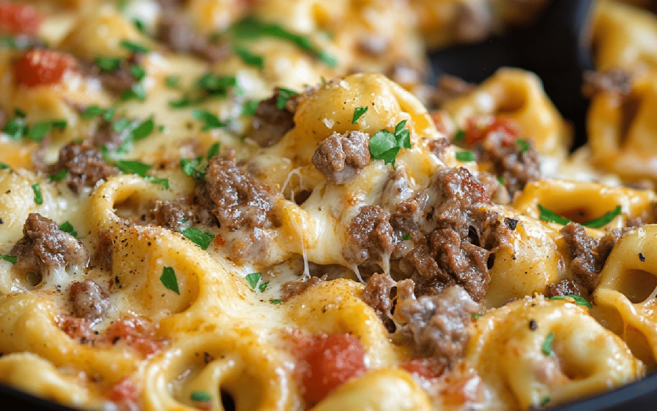 cheesy cheesesteak tortellini combines steak, peppers, and pasta in one hearty skillet dish